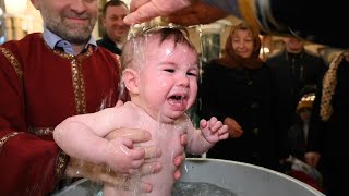 Georgia: hundreds of people turn up for mass baptism | AFP