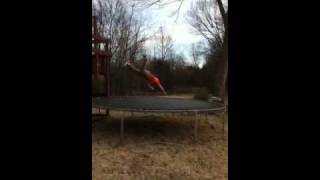 Me jumping off top of swingset.
