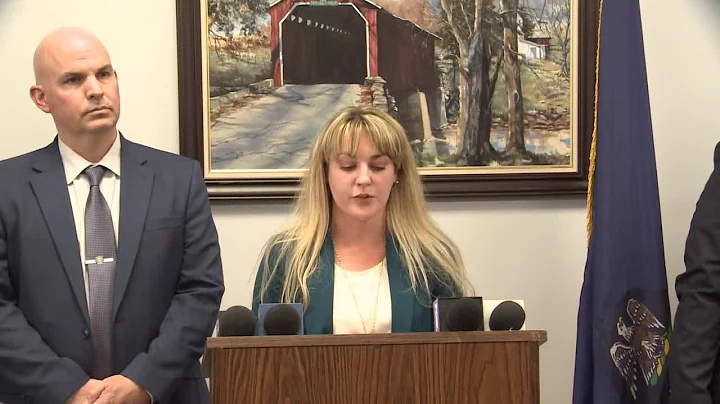Woman arrested, charged with killing husband in 19...