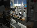 Automatic labeling machine for box packing.#ecommerce #packing #warehouse #logistics