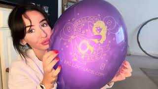 Blowing Up A Balloonace Purple And Yellow Balloon