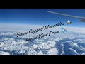 Beautiful view of snow capped mountains from plane before landing at seattle international airport