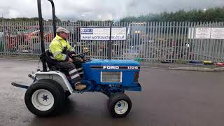 Ford 1220 4 wheel drive compact tractor October auction 3154