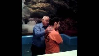Rachel Brasfield being baptized