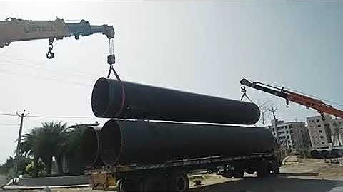 Gujarat me water line pipe trailor se unloading karte hue dual hydra