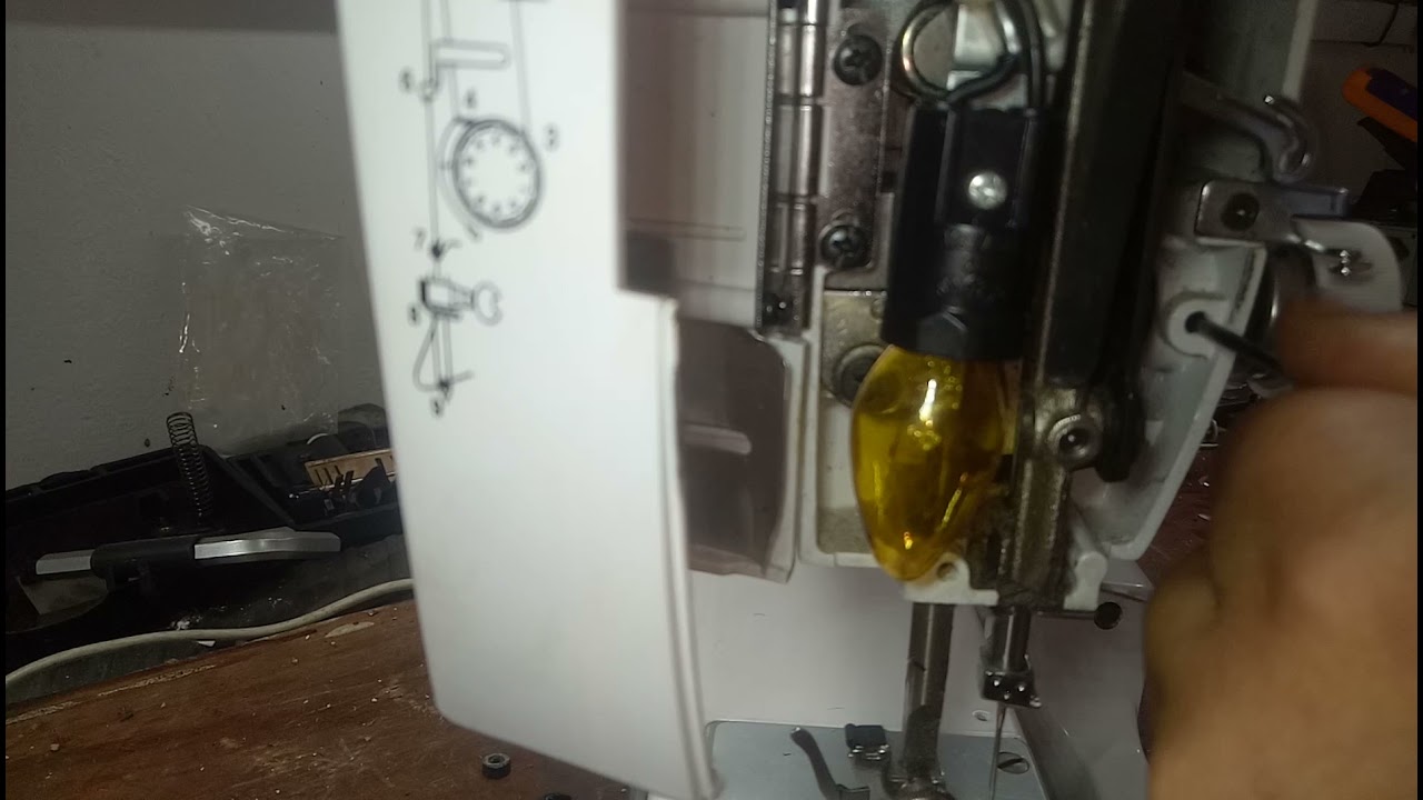 comment réparer un machine à coudre super zig-zag la 878)(كيفية إصلاح ماكينة خياطة فائقة التعرج )
