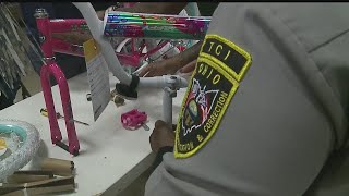 Prisoners in Trumbull County put together bikes for foster children