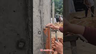 Drill iron into concrete columns to fix the wall