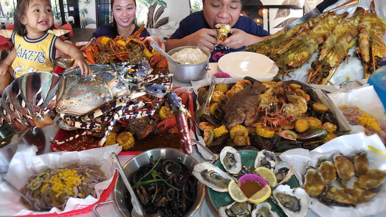 We tried nearly every dish on the menu at Tat's Seafood Dampa - What a Big Seafood Feast!