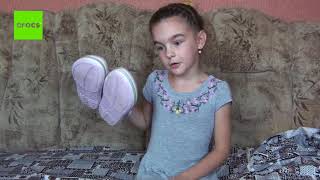 little girl Ulya advertises Crocs