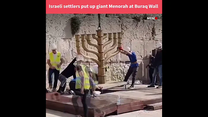 Israeli settlers put up giant Menorah at Buraq Wall