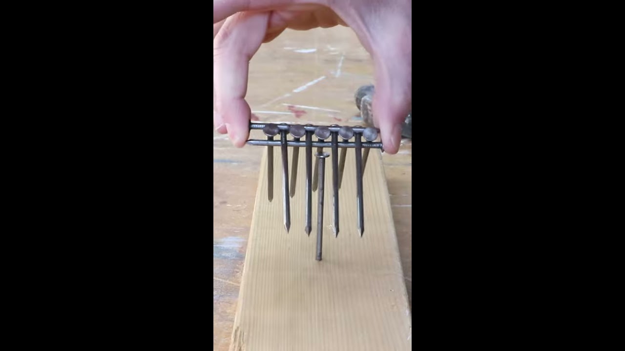 Puzzle: Balance all of the nails on top of the standing nail - BrainFuel