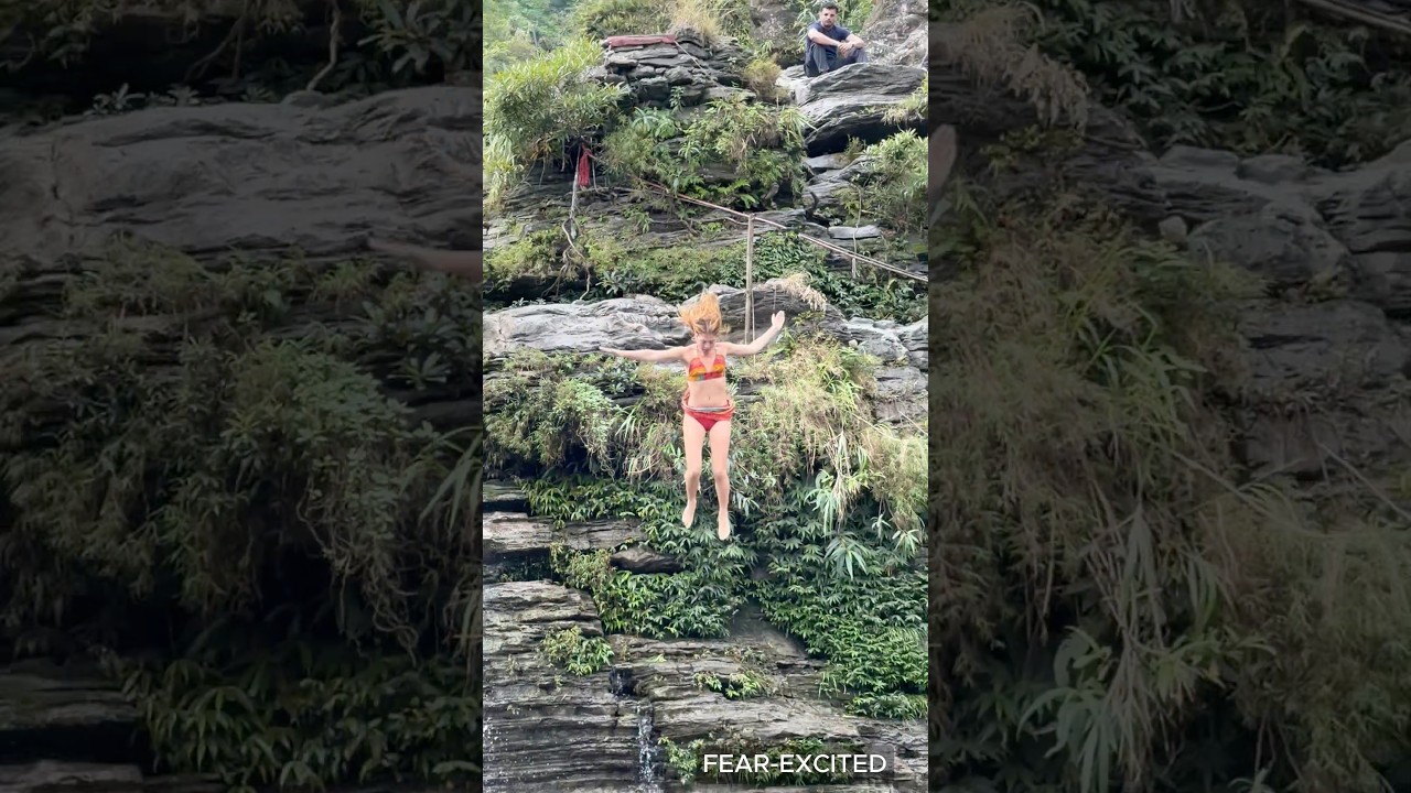 Beautiful Girls Enjoying Fresh Winter Waterfall Air