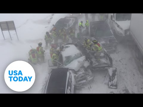 Rescuers battle blizzard-like conditions on North Dakota interstate | USA TODAY