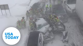 Rescuers battle blizzard-like conditions on North Dakota interstate | USA TODAY
