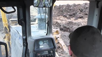 The komatsu 155 actually handles pretty well!!