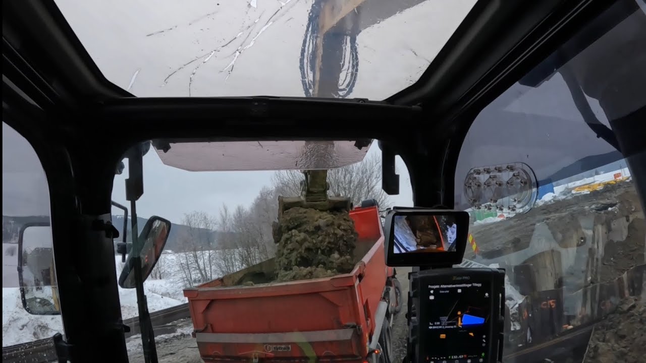 CATERPILLAR 335 excavator with Oilquick and rototilt DIGGING out a big sheet pile pit. PART 2