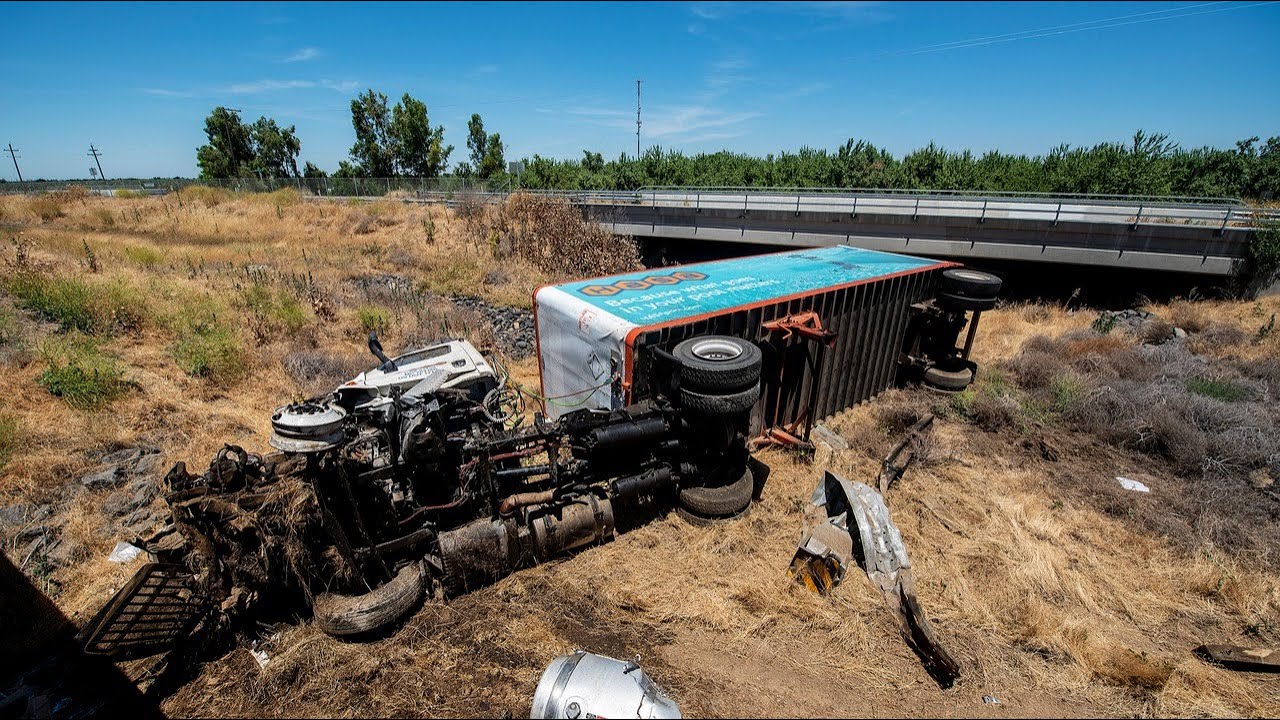 Big rig overturns into dry creek along Highway 99 in Merced County ...
