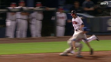 NYM@ATL: Harvey charges on a bunt, fires to first