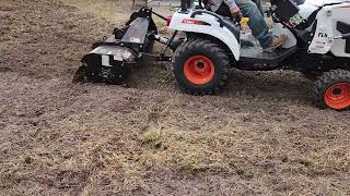 Bobcat 1025 with Rotary Tiller Attachment