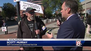 Protesters gather outside Sen. Collins' Portland office