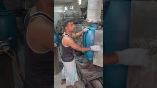 With amazing technique, the factory processing of making large plastic drums.