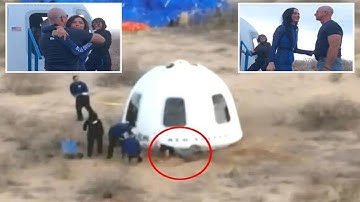 Jeff Bezos takes a tumble  he excitedly greets fiancée Lauren Sanchez after Blue Origin space flight
