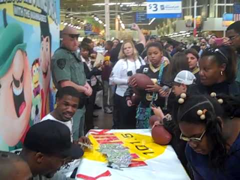 Scott's Hugs For Haiti (Saints-Players invade Bato...