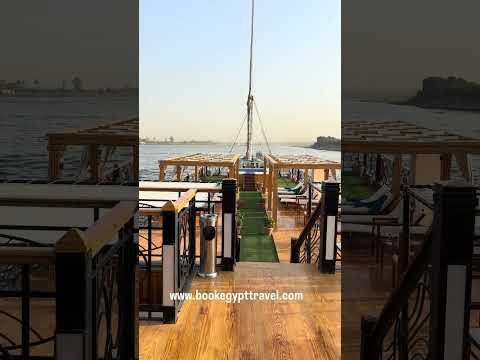 Sailing on the Nile in a  Boat with Book Egypt Travel.