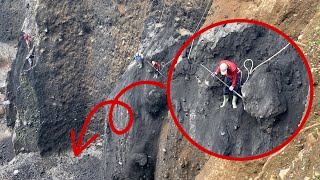 Dropping rocks from extreme cliffs with simple safety equipment