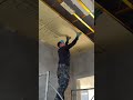The process of installing gypsum plasterboard on the ceiling