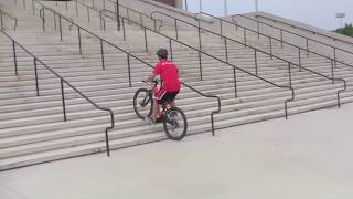 UMD Student Glides Up the Xfinity Center Stairs on 408R E-Mountain Bike