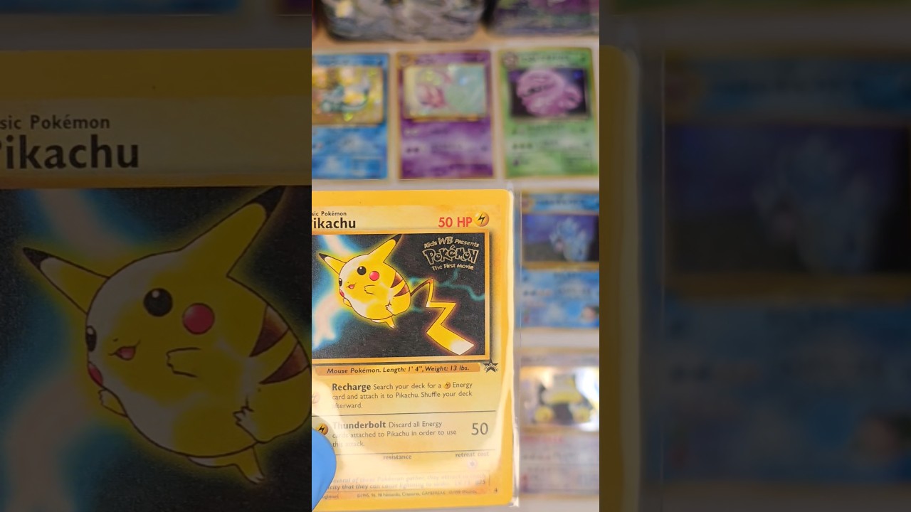 first pokemon movie pikachu card Pokémon Card First Movie #28 The Chase For Pikachu Blue Logo 1st Print –  AGS Collectibles main image 1