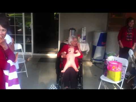 funny-grandma-birthday-present-with-blow-up-doll
