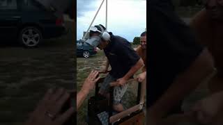 Man Standing in a Custom Realistic VR Seat While Playing