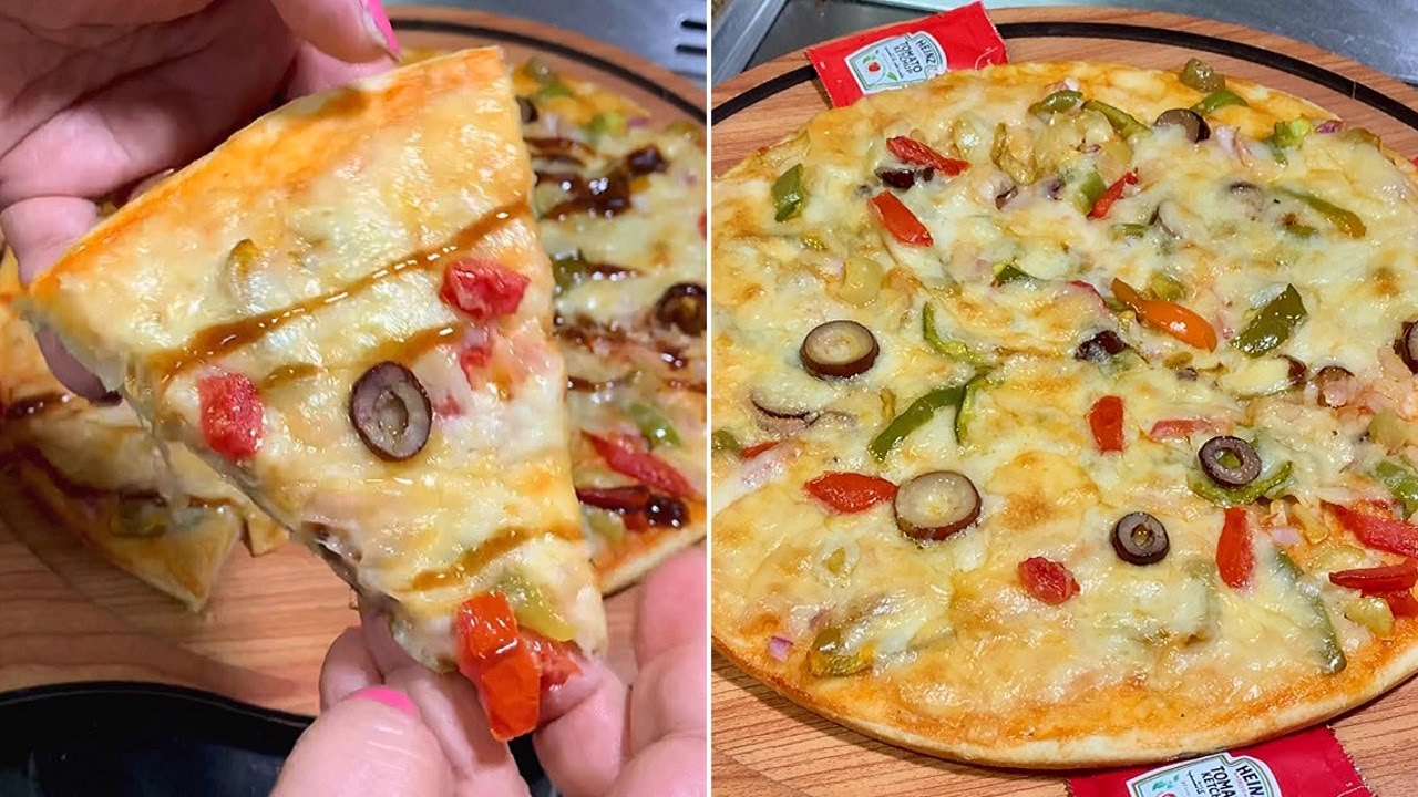 بيتزا صيامي بشوية دقيق وماية بدون لبن ولا بيض😋بيتزا نباتي روعة بعجينة طرية وهشة جربوها وعلي ضمانتي