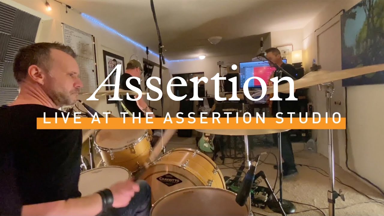 Assertion - "Supervised Suffering" (Live at the Assertion Studio) auf YouTube ansehen Assertion - "Supervised Suffering" (Live at the Assertion Studio) auf YouTube ansehen