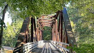 Crossing An Old Railroad Bridge Along The Abandoned Railway