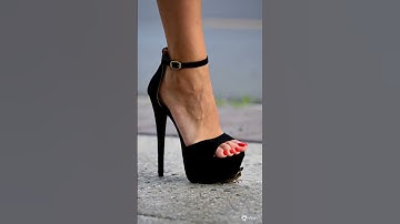 grasshopper try to escape under the high heels