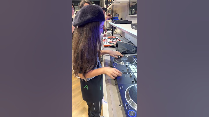 10 years old Dj Michelle scratching on Pioneer DDJ-REV7 controller