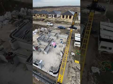 Печать двух этажного дома в России. printing a two-story house using a construction 3d printer.