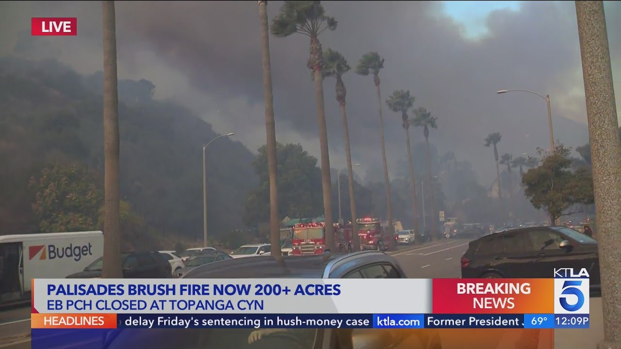 'Evacuate now': Wildfire threatens homes in L.A.'s Pacific Palisades area