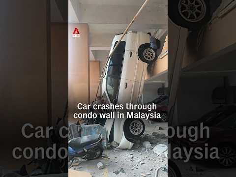 Car crashes through condo wall in Malaysia