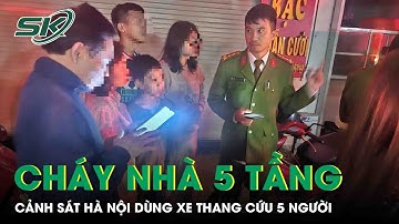 Hỏa hoạn tại ngôi nhà 5 tầng ở Hà Nội, cảnh sát dùng xe thang cứu gia đình 5 người