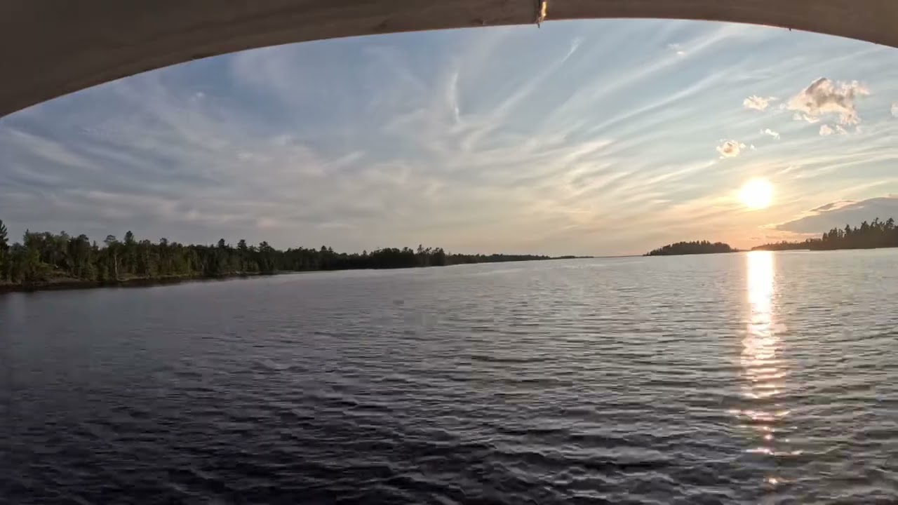 Sunset dinner cruise from Swell Bay to Rainy Lake Houseboat Base.  