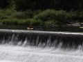 Kayakers Going Over the Dam in Tumwater Canyon