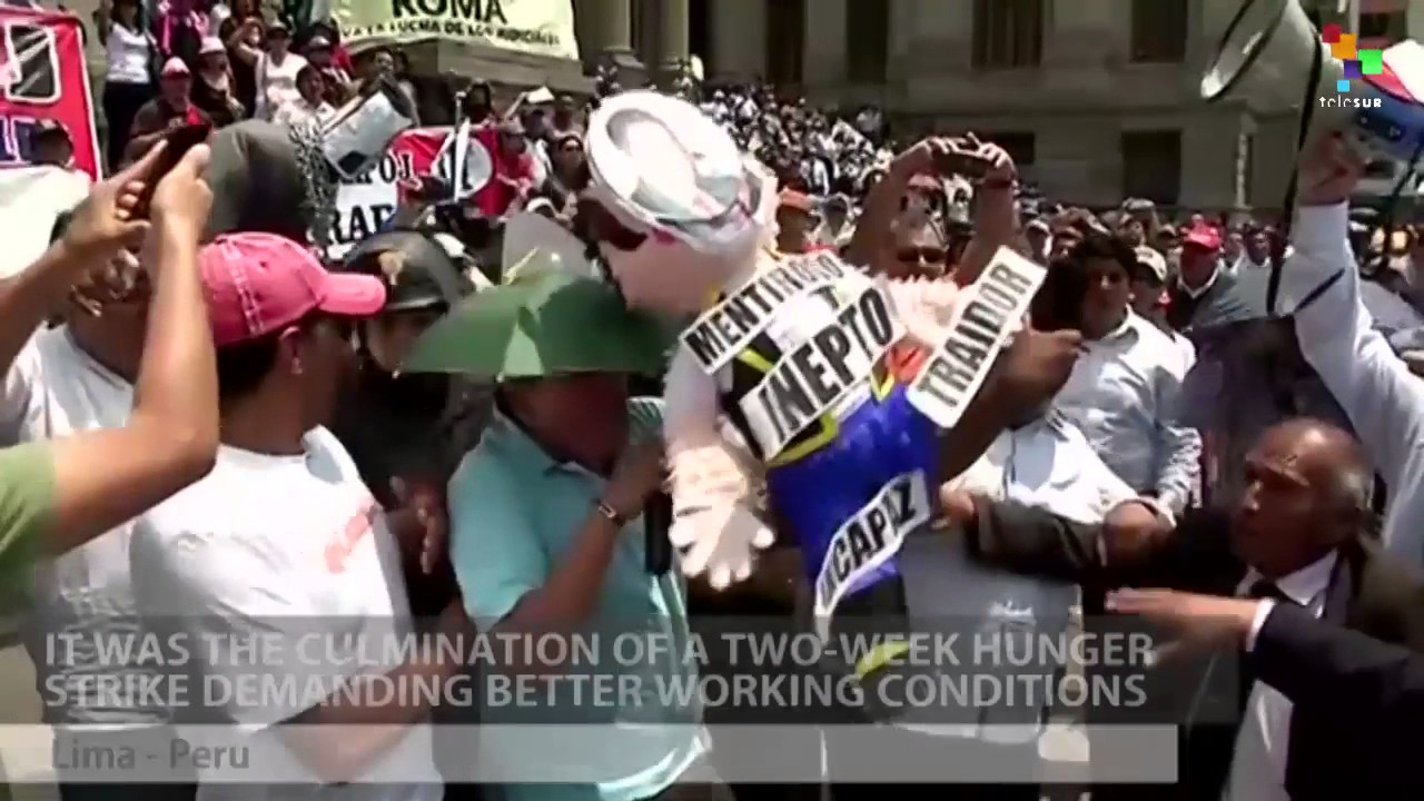 Striking Court Workers Clash With Police in Lima