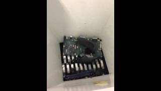 Evashred EV30E 16mm shredding a box of electrical components