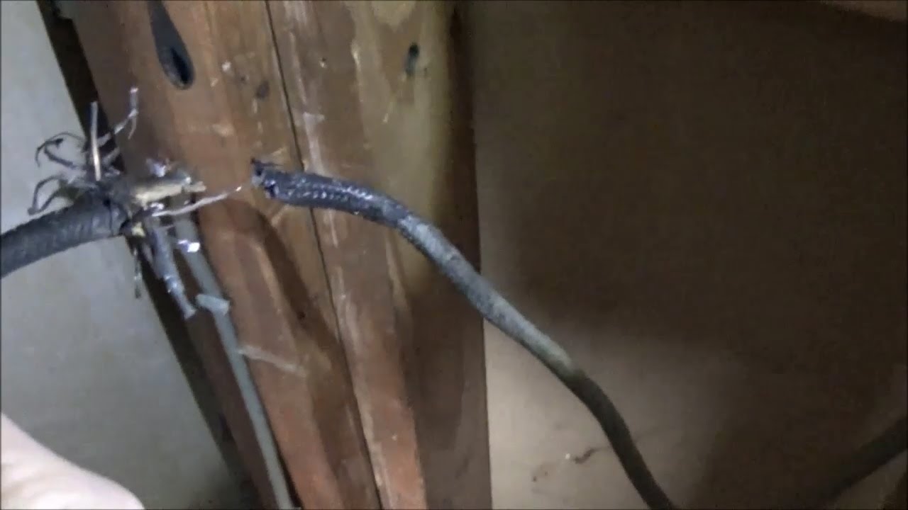 Nail through braided electrical wire, aftermath. - YouTube