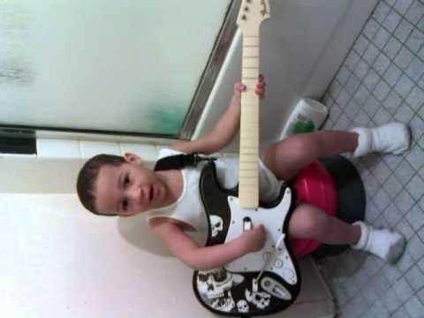 My nephew Bryan playing his guitar and singing in ...